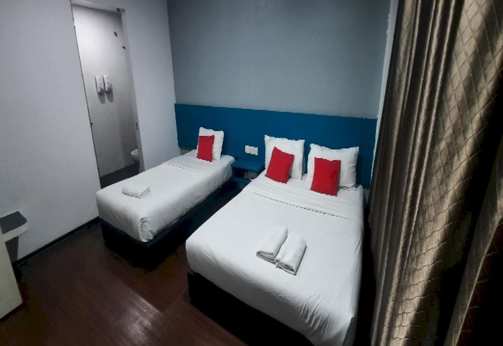 Super Oyo 90724 Rg Hotel Air Hitam Exterior photo
